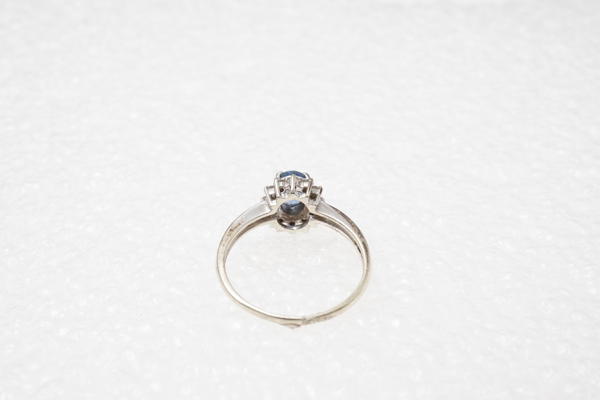 A sapphire and diamond cluster ring